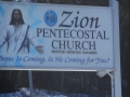 Sign at entrance to Pentecostal  Church in Northwest Brook. (Photo by Lester Green)