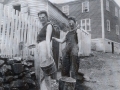 Annie Blanche Smith and Kay Doyle Liming the fence at her fathers home Joseph Edward Seward