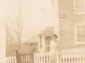 Julia Stoyles in front of Emarld House home of WJ Frost
