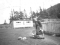 Fred and Rebecca Drover -Hodges Cove-  Note the Anglican Parsonage in background amid trees