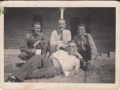 Joe Drover lying down with Roland Smith and others HC