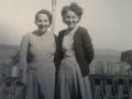 Priscilla Strong daughter of Jessie Price married to Josiah Drodge taken in Caplin cove not sure who other lady on the right with sweater on is.