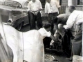 Patching a tire near Grandmother Vey's store late 1950's