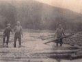 William King, Baxter King, Azariah King and Cater King driving logs at Deer Harbour River. (Photo donated by Clarence King) (2)