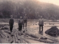 William King, Baxter King, Azariah King and Cater King driving logs at Deer Harbour River. (Photo donated by Clarence King)