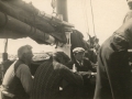 Men on deck of a schooner on Southern Shore resting on a Sunday. (Photo_Olive Green's Collection)