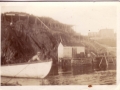 Motor boat anchored at David Jacobs Wharf. Note the flakes on the hills in background. (photo Olive Green Collection)