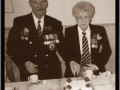 Leander-and-Kitty-cutting-cake-89-Veterans-nightBW3_inPixio