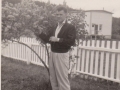 Ron Robbins, Eleazer Robbins house in background, Hatchet Cove