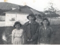 Vera Spurrell, Lilly Spurrell, and Maxine Spurrell with Solomon Spurrell's House in backgound (Photo donated by Barb Chwojka)